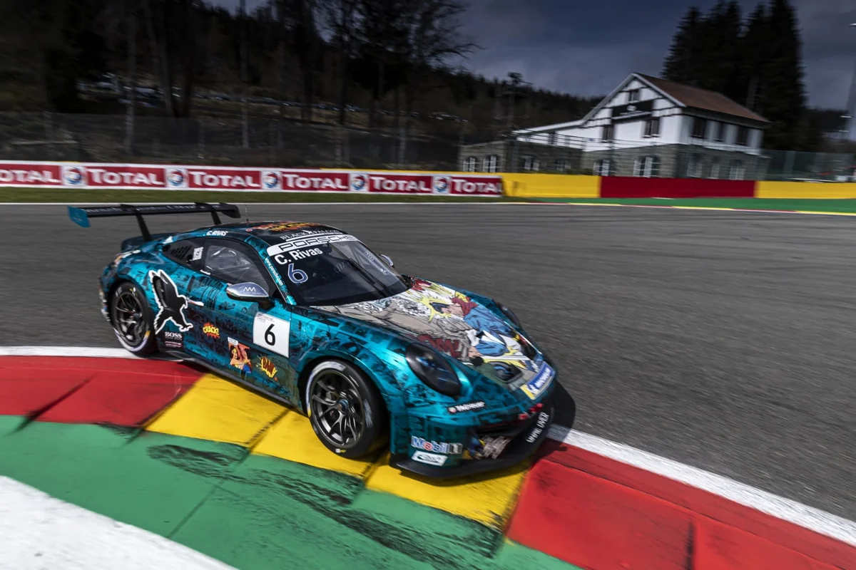 Blue CR6 Porsche crossing the red and yellow kerbs at Spa, archive photograph